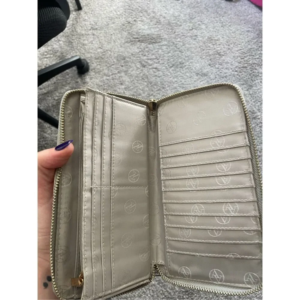 AA silver clutch with gold zipper